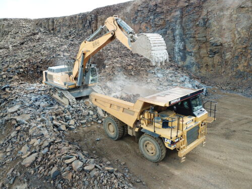 Quarry Dump Truck Being Loaded